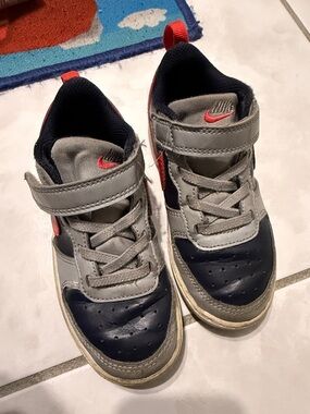 Nike Kids Navy and Gray Sneakers with Coral Swoosh
